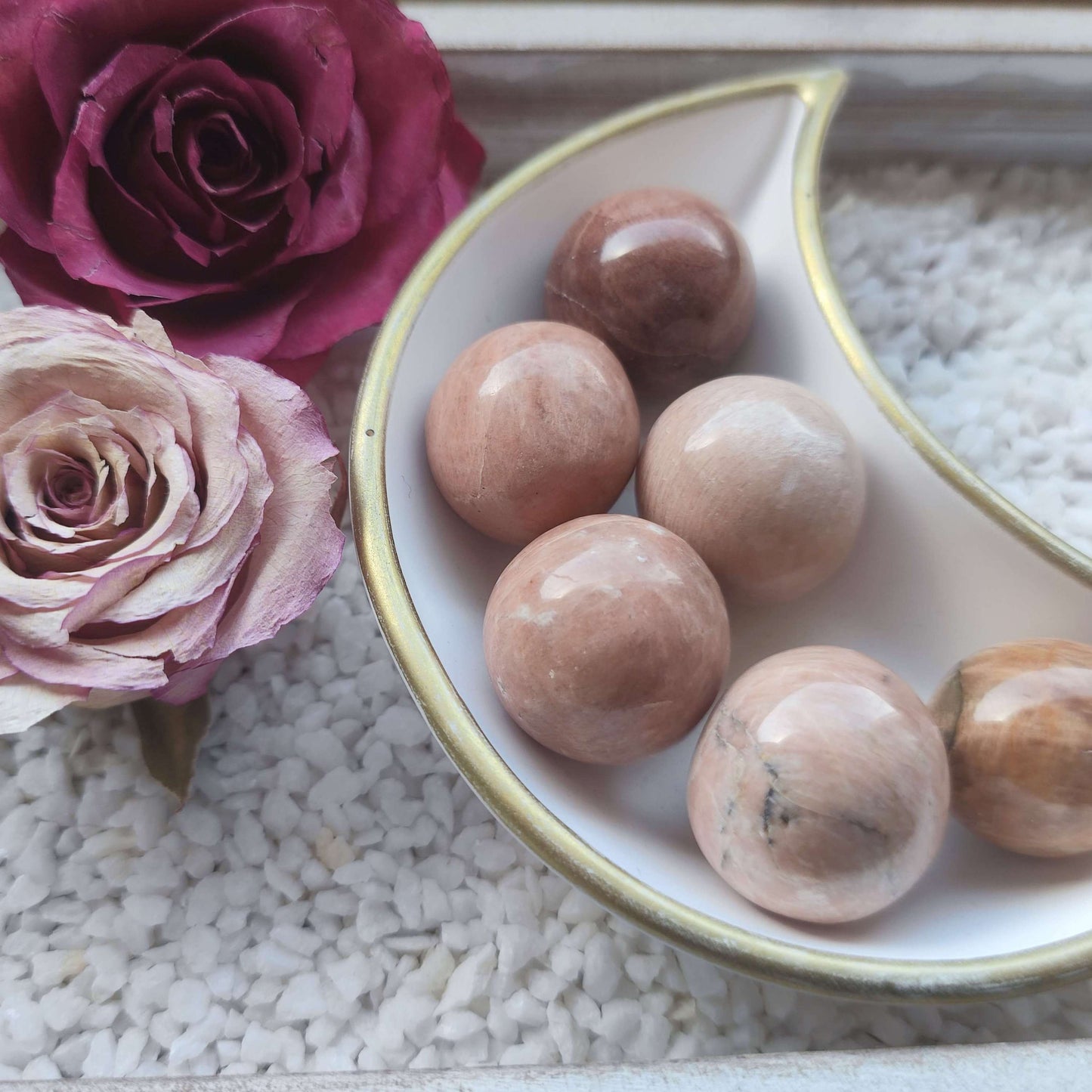 Aprikosenmondstein Trommelstein